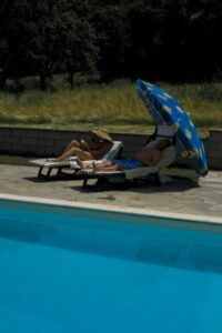 Ved bassenget Ved bassenget